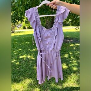 Boutique dress. Never worn. Still has the tag.